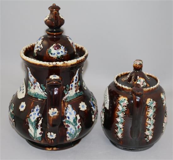 Two Meescham pottery teapots and covers, 32.5cm and 20cm